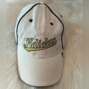 Adidas Cream Cap with Navy Trim and pale yellow and gray “Adidas” on front